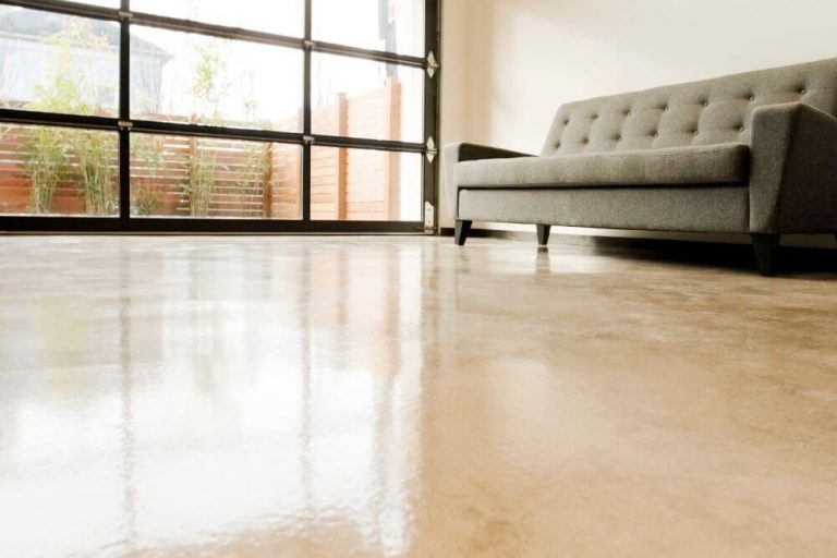 polished concrete floor with a sofa